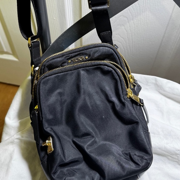Tumi Women's Crossbody Bag Black with Gold Zippers - Picture 1 of 7